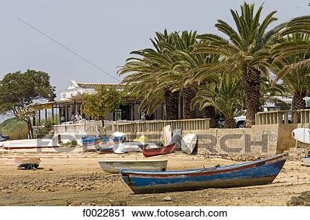 Portugal, Algarve, Cacela Velha, beach, fishing boats View Large Photo Image Stock Image - Portugal, Algarve, Cacela Velha, beach, fishing boats. Fotosearch