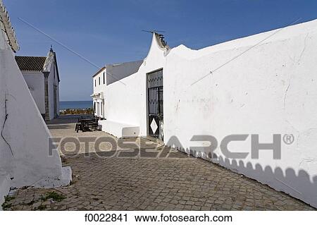 Stock Image - Portugal, Algarve, Cacela Velha, village lane. Fotosearch