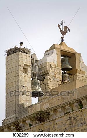 Stock Image - Portugal, Algarve, Faro, cathedral, belfry and stork nest. Fotosearch
