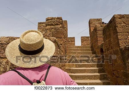 Stock Image - Portugal, Algarve, Silves, Moorish castle ruins, tourist. Fotosearch