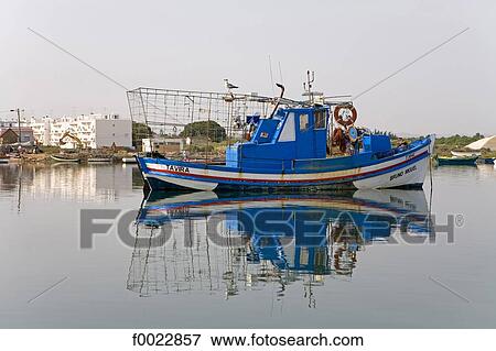 Portugal, Algarve, Tavira, fishing boat View Large Photo Image Stock Photo - Portugal, Algarve, Tavira, fishing boat. Fotosearch