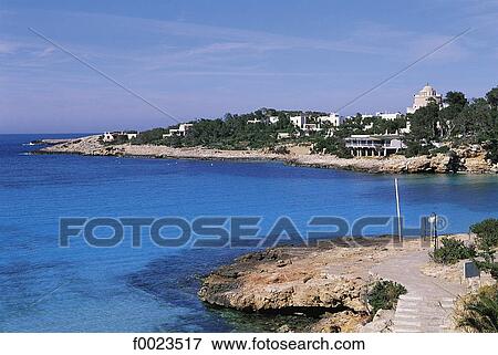 Spain, Balearic Islands, Ibiza, Es Cubells, coastal landscape View Large Photo Image Stock Photo - Spain, Balearic Islands, Ibiza, Es Cubells, coastal landscape. Fotosearch