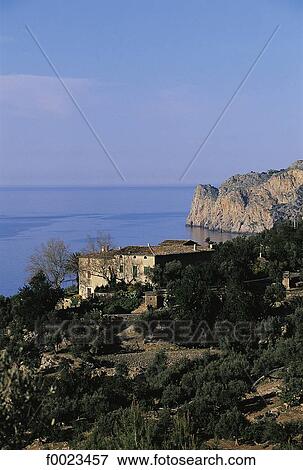 Spain, Balearic Islands, Majorca, Deia, coastal landscape View Large Photo Image Stock Photo - Spain, Balearic Islands, Majorca, Deia, coastal landscape. Fotosearch