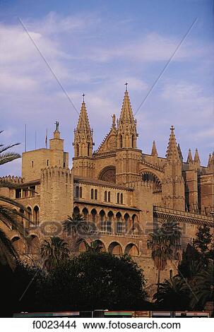 Spain, Balearic Islands, Majorca, Palma de Majorca, Almudaina Palace and cathedral View Large Photo Image Picture - Spain, Balearic Islands, Majorca, Palma de Majorca, Almudaina Palace and cathedral. Fotosearch