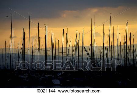 Picture - Switzerland, Lausanne, marina at dusk. Fotosearch