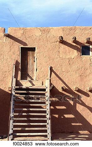Stock Image - United States, New Mexico, Santa Fe, traditional adobe house. Fotosearch