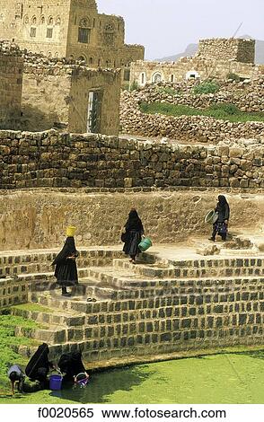 Yemen, Shahara, water tanks, women carrying water View Large Photo Image Stock Photography - Yemen, Shahara, water tanks, women carrying water. Fotosearch