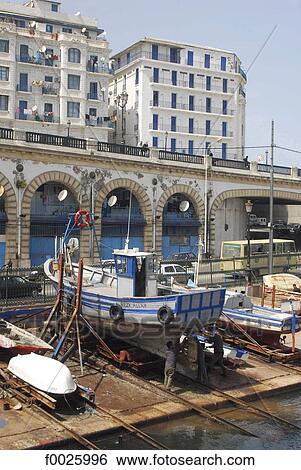 Algeria, Algiers, fishing port, boat refitting View Large Photo Image Stock Photograph - Algeria, Algiers, fishing port, boat refitting. Fotosearch