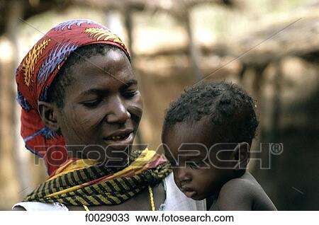 Burkina Faso, Gurma country, woman and her baby View Large Photo Image Stock Image - Burkina Faso, Gurma country, woman and her baby. Fotosearch