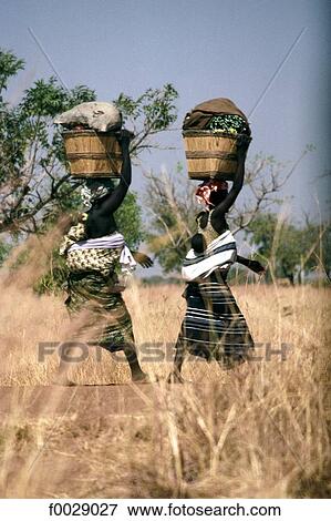 Burkina Faso, near Koupela, women going to the market View Large Photo Image Stock Photo - Burkina Faso, near Koupela, women going to the market. Fotosearch
