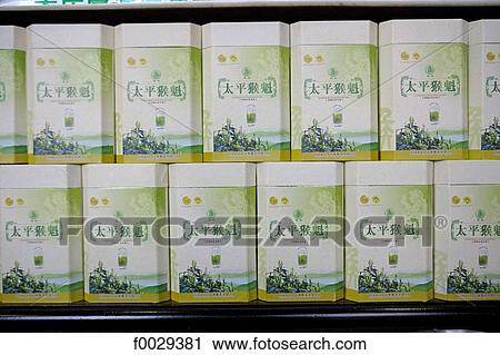 Stock Image - China, Anhui, Tunxi, merchant street, green tea boxes. Fotosearch