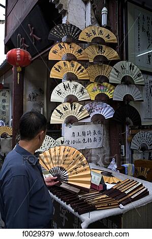 Stock Photo - China, Anhui, Tunxi, merchant street built in Song Dynasty, fans shop. Fotosearch