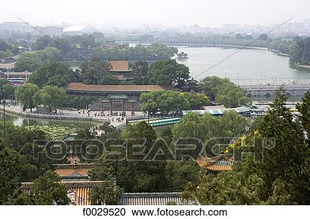 China, Beijing, Beihai Park, Jade island, the lake and the city seen from the top of the white pagoda View Large Photo Image Stock Image - China, Beijing, Beihai Park, Jade island, the lake and the city seen from the top of the white pagoda. Fotosearch