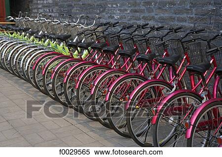 Stock Photography - China, Beijing, bikes for rent. Fotosearch