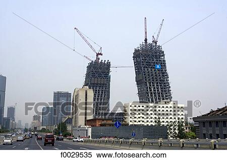 China, Beijing, construction of the Chinese television CCTV headquarters designed by Rem Koolhaas View Large Photo Image Stock Photography - China, Beijing, construction of the Chinese television CCTV headquarters designed by Rem Koolhaas. Fotosearch