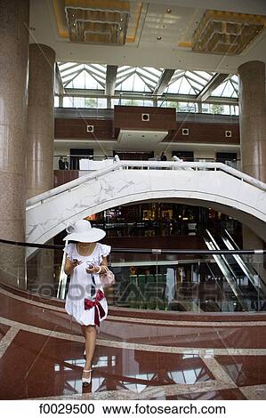 Stock Image - China, Beijing, hall of a luxury hotel. Fotosearch