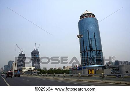 China, Beijing, office tower and Chinese television CCTV headquarters under construction View Large Photo Image Picture - China, Beijing, office tower and Chinese television CCTV headquarters under construction. Fotosearch
