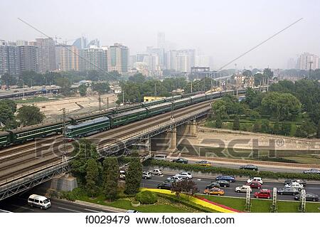 China, Beijing, railroad and general view over the city from the ramparts View Large Photo Image Stock Photo - China, Beijing, railroad and general view over the city from the ramparts. Fotosearch