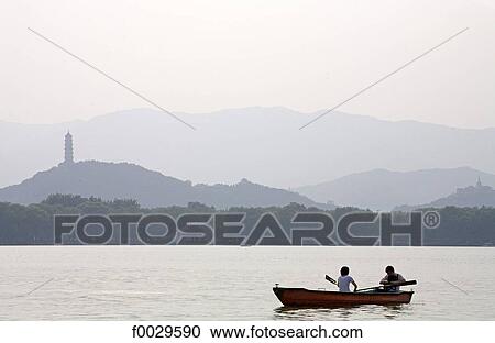China, Beijing, Summer Palace "Yiheyuan", Kunming Lake and Yu Quan Hill with Yu Feng Pagoda in the background View Large Photo Image Stock Image - China, Beijing, Summer Palace "Yiheyuan", Kunming Lake and Yu Quan Hill with Yu Feng Pagoda in the background. Fotosearch