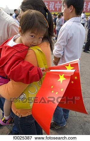 China, Beijing, Tiananmen Square, during the National Day, young girl with a chinese flag View Large Photo Image Stock Photo - China, Beijing, Tiananmen Square, during the National Day, young girl with a chinese flag. Fotosearch
