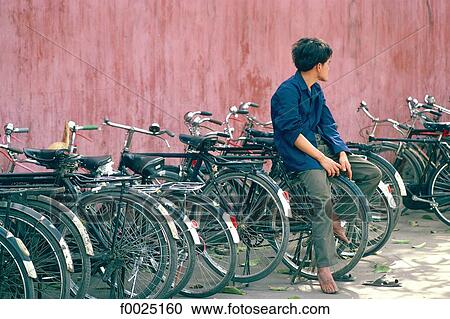Stock Image - China, Guangzhou, bicycles. Fotosearch
