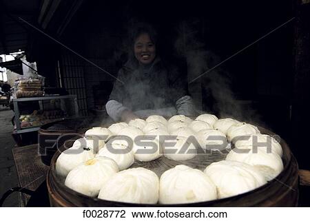 China, Jiangsu, Suzhou, cooking "Dim Sum" on a steam device View Large Photo Image Stock Image - China, Jiangsu, Suzhou, cooking "Dim Sum" on a steam device. Fotosearch
