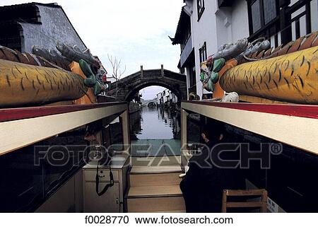 China, Jiangsu, Suzhou, dragon boat on a canal View Large Photo Image Stock Image - China, Jiangsu, Suzhou, dragon boat on a canal. Fotosearch