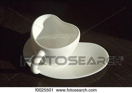 Stock Image - China, near Shuiguan, Commune by the Great Wall Hotel, coffee cup. Fotosearch