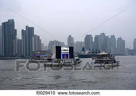 Stock Image - China, Shanghai, advertising barge. Fotosearch
