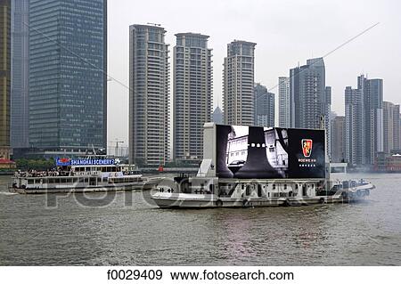 Stock Photo - China, Shanghai, advertising barge. Fotosearch