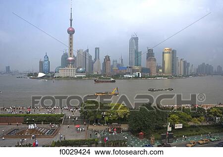China, Shanghai, the Bund promenade, Huangpu River and new town of Pudong View Large Photo Image Picture - China, Shanghai, the Bund promenade, Huangpu River and new town of Pudong. Fotosearch