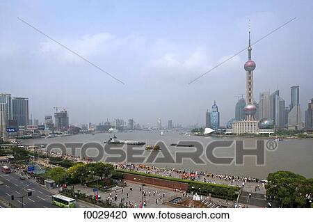 China, Shanghai, the Bund promenade, Huangpu River and new town of Pudong View Large Photo Image Stock Image - China, Shanghai, the Bund promenade, Huangpu River and new town of Pudong. Fotosearch