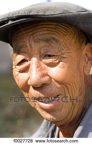 Stock Photo - China, Shanxi province, Tian Ja Lun, portrait. Fotosearch
