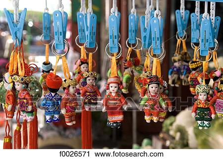 China, Yunnan, Dali, dolls wearing traditional costume View Large Photo Image Stock Image - China, Yunnan, Dali, dolls wearing traditional costume. Fotosearch