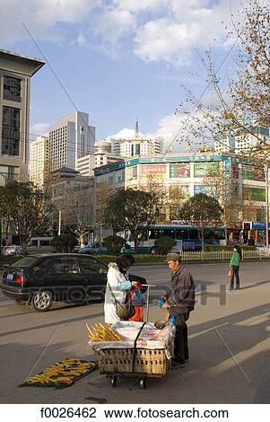 China, Yunnan, Kunming, street scene View Large Photo Image Stock Image - China, Yunnan, Kunming, street scene. Fotosearch