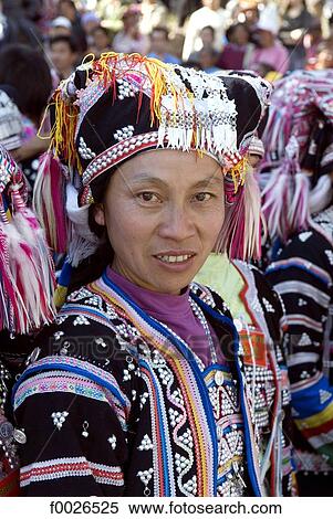 Stock Photography - China, Yunnan, Lancang, Aini woman wearing traditional costume. Fotosearch