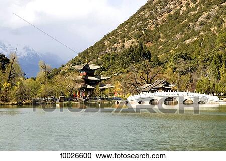 China, Yunnan, Lijiang, black dragon pool Park, pavilion View Large Photo Image Stock Image - China, Yunnan, Lijiang, black dragon pool Park, pavilion. Fotosearch