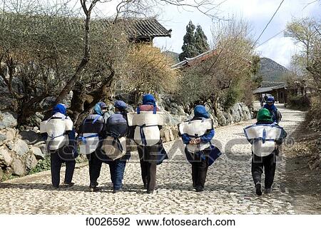 China, Yunnan, near Lijiang, Naxi women View Large Photo Image Stock Image - China, Yunnan, near Lijiang, Naxi women. Fotosearch