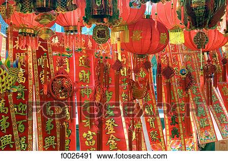 China, Yunnan, Xishuangbanna, Jinghong, Chinese lucky charms for sale View Large Photo Image Stock Image - China, Yunnan, Xishuangbanna, Jinghong, Chinese lucky charms for sale. Fotosearch