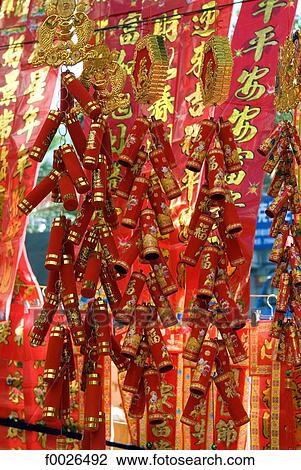 Stock Image - China, Yunnan, Xishuangbanna, Jinghong, Chinese lucky charms for sale. Fotosearch