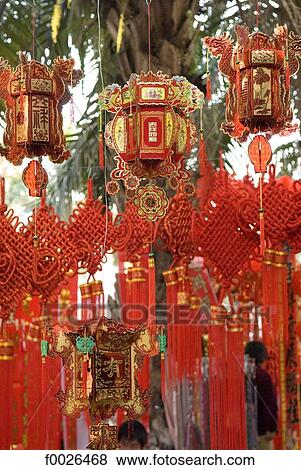 China, Yunnan, Xishuangbanna, Jinghong, Chinese lucky charms for sale View Large Photo Image Stock Photo - China, Yunnan, Xishuangbanna, Jinghong, Chinese lucky charms for sale. Fotosearch