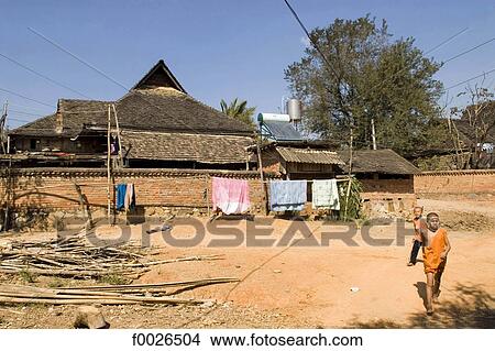 China, Yunnan, Xishuangbanna, near Damenglong, Dai village View Large Photo Image Picture - China, Yunnan, Xishuangbanna, near Damenglong, Dai village. Fotosearch