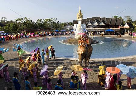 China, Yunnan, Xishuangbanna, near Jinghong, Dai Minority Park, during Water Splashing Festival View Large Photo Image Stock Image - China, Yunnan, Xishuangbanna, near Jinghong, Dai Minority Park, during Water Splashing Festival. Fotosearch