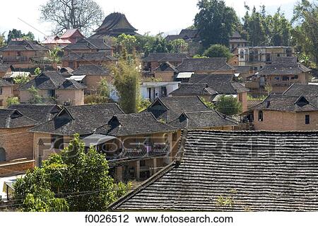 China, Yunnan, Xishuangbanna, near Menghai, Jingzhen, Dai village View Large Photo Image Stock Image - China, Yunnan, Xishuangbanna, near Menghai, Jingzhen, Dai village. Fotosearch