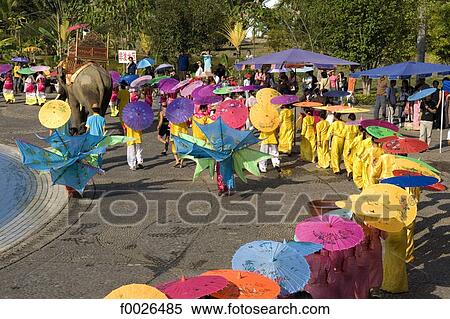 China, Yunnan, Xishuangbanna, near Jinghong, Dai Minority Park, during Water Splashing Festival View Large Photo Image Stock Photography - China, Yunnan, Xishuangbanna, near Jinghong, Dai Minority Park, during Water Splashing Festival. Fotosearch