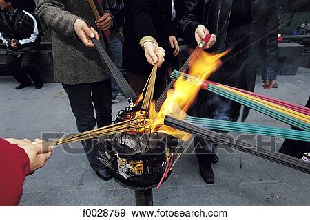 China, Zhejiang, Hangzhou, Lingyin temple, believers burning incense View Large Photo Image Stock Photo - China, Zhejiang, Hangzhou, Lingyin temple, believers burning incense. Fotosearch