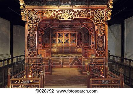 Stock Image - China, Zhejiang, Wushen, museum, ancient carved bed. Fotosearch