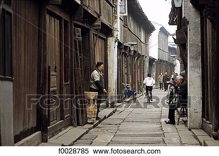 China, Zhejiang, Wushen, pedestrian main street, traditional architecture View Large Photo Image Stock Photography - China, Zhejiang, Wushen, pedestrian main street, traditional architecture. Fotosearch