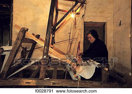 China, Zhejiang, Wushen, woman using an old loom View Large Photo Image Stock Image - China, Zhejiang, Wushen, woman using an old loom. Fotosearch