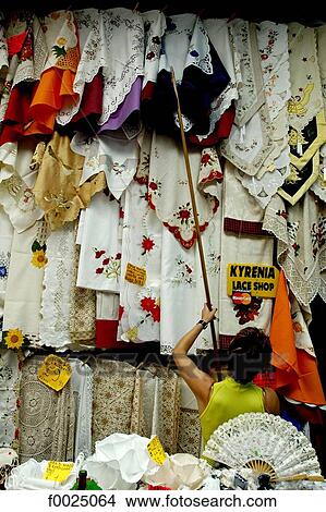 Picture - Cyprus, Paphos, embroidered tablecloths for sale at the market. Fotosearch
